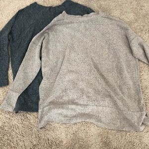 2 fuzzy Cherish brand sweaters.